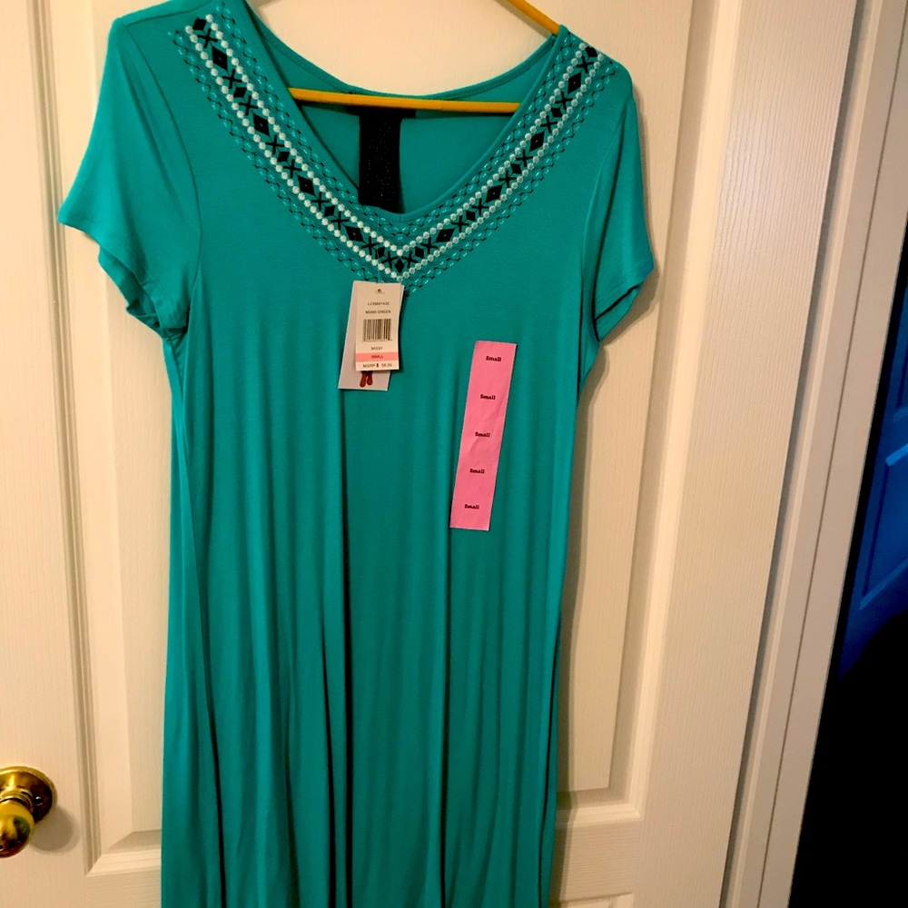 Fantastic ladies summer dress that will make a splash In It’s “Miami Green”.